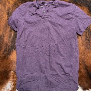 Plain purple T-shirt with two buttons in collar